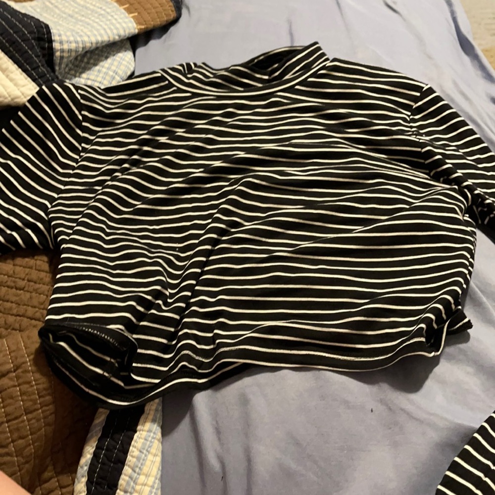 It’s a black and white crop top.